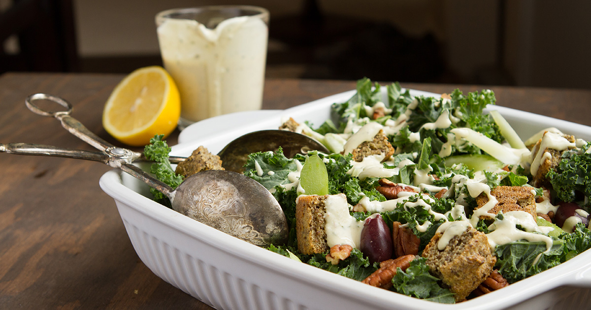 Kale Salad with Olives, Chia Croutons + Creamy Lemon Rosemary Dressing - Healthful Pursuit