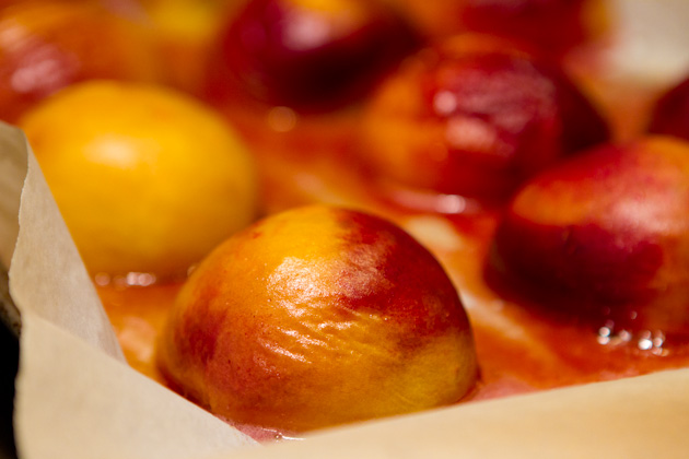 Peaches on baking sheet